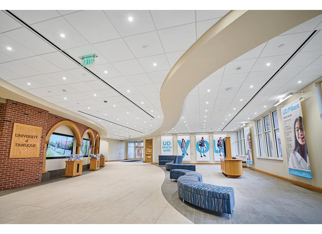 ULTIMA High-NRC Ceiling Panels / SUPRAFINE 9/16" Suspension System / Drywall Grid System / SimpleCurve trim / AXIOM Classic 6" Trim